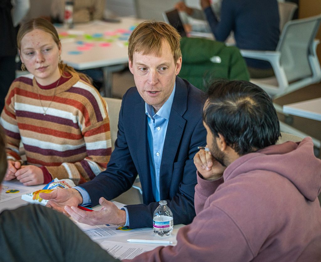 Dr. Abram Anders with students
